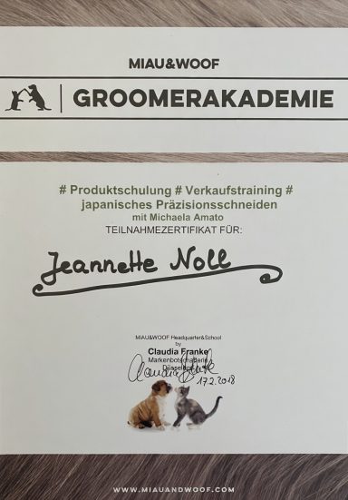 Zertifikat der Groomerakademie für Jeannette Wolf, inklusive Unterschrift und Tierbildern.